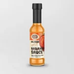 Bottle of Oregon® Habanero Sauce with vibrant red and orange label featuring a spicy hot pepper design, showcasing a fiery, flavorful condiment made from fresh habanero peppers for added heat and bold taste.